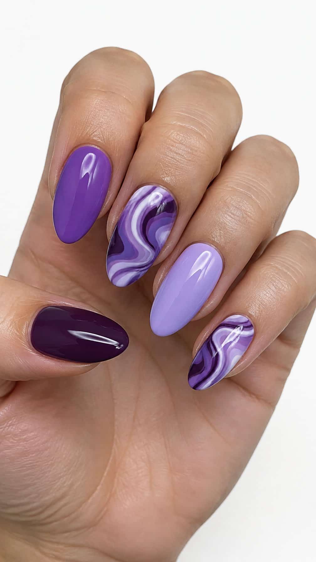 Glossy purple marble-patterned nails