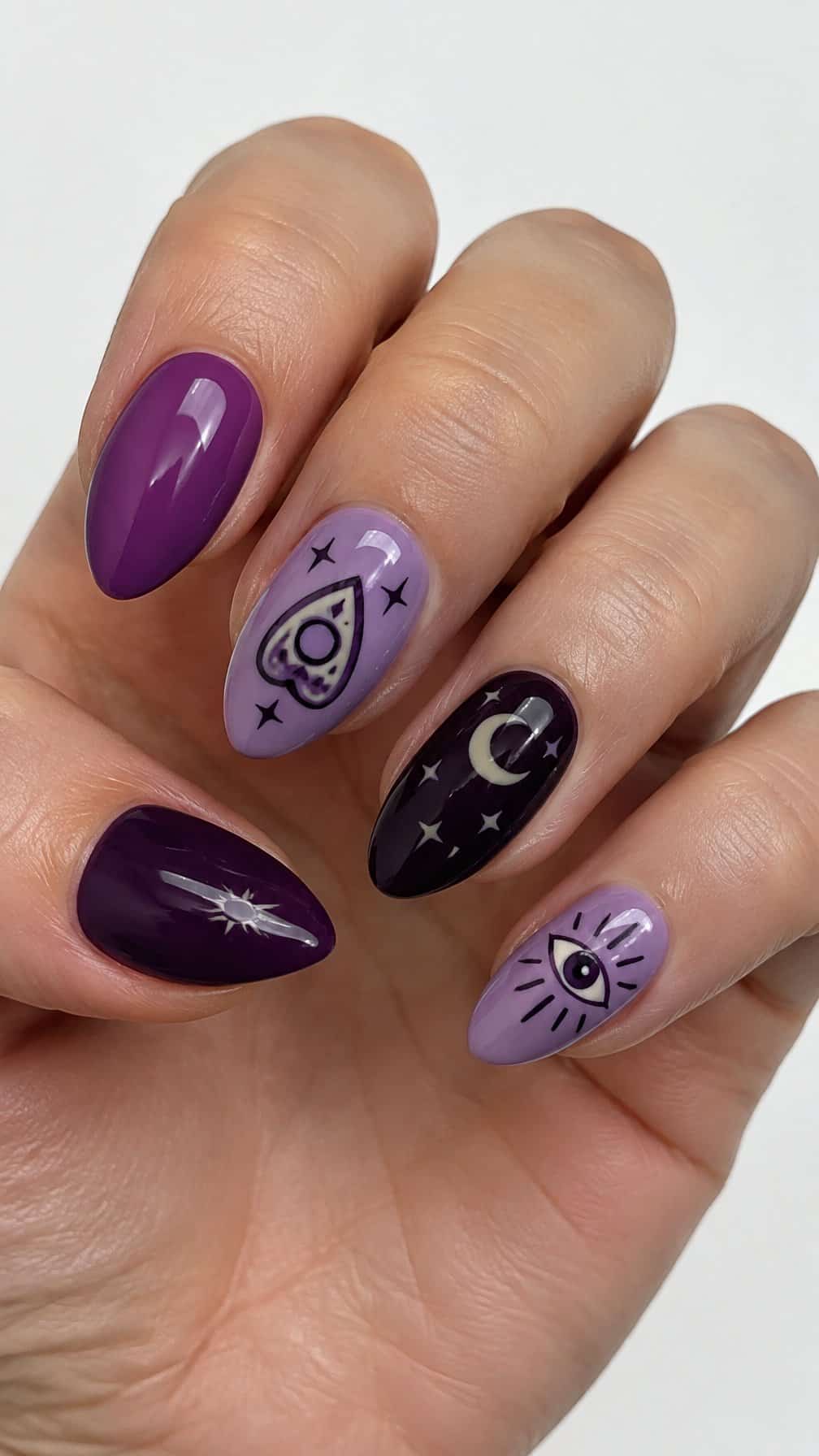 Glossy purple Halloween-themed nail art