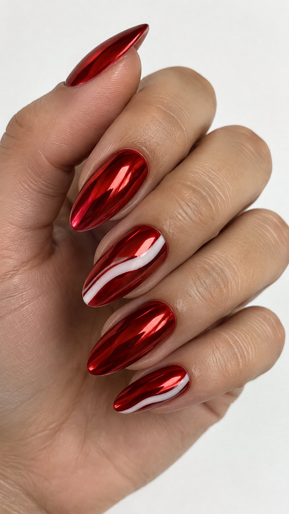 Glossy red almond-shaped nails