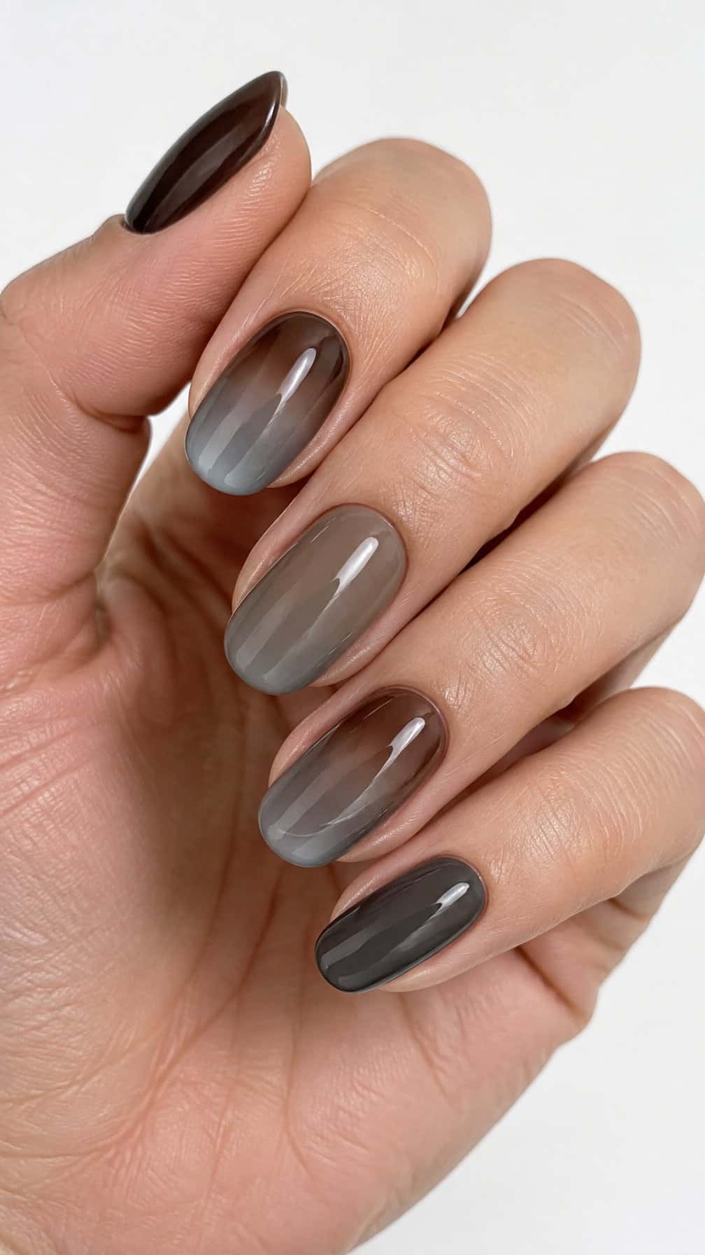 Glossy brown and gray ombre gel-polished nails