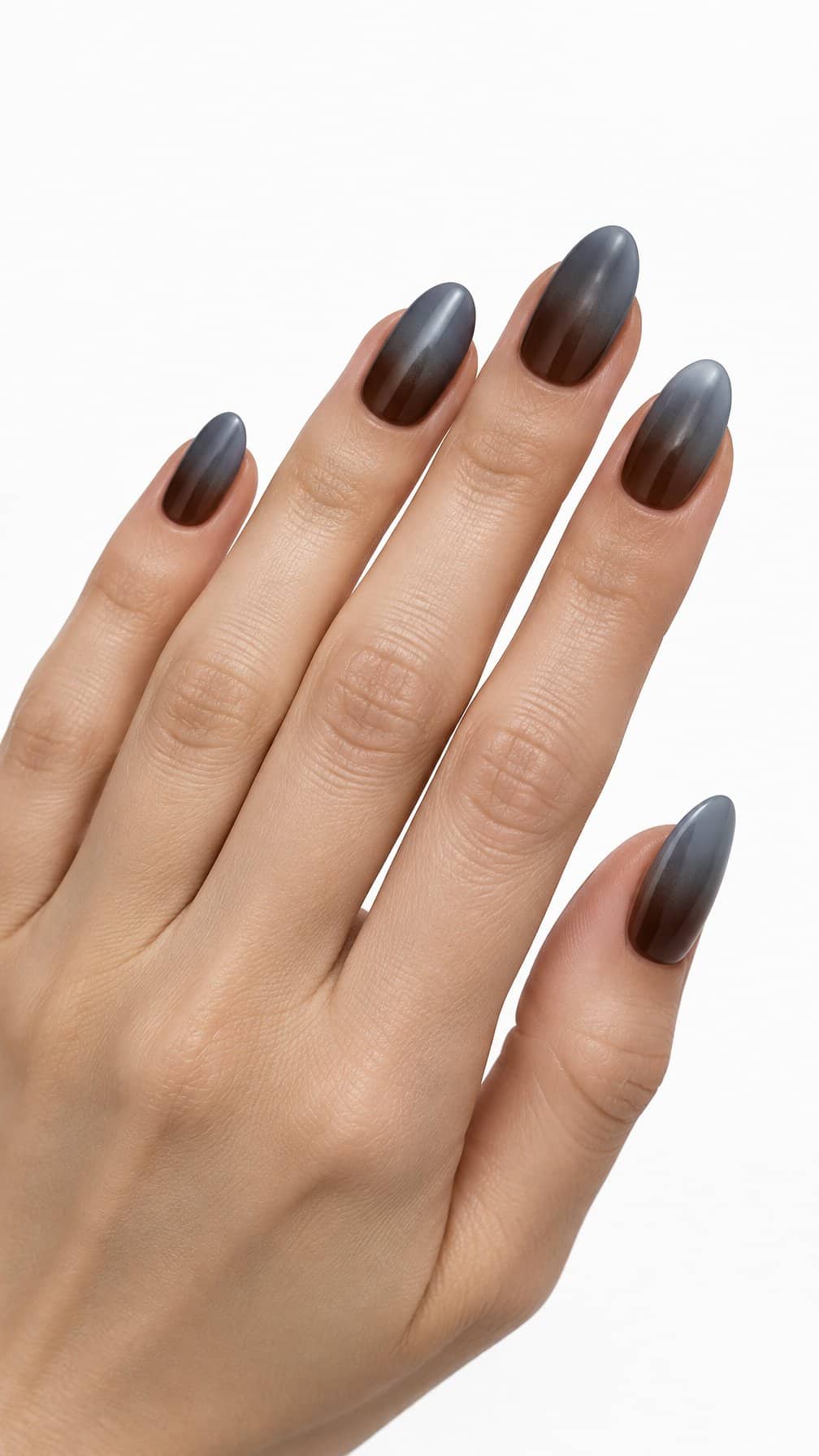 Almond-shaped nails with smoky brown-to-gray ombre polish