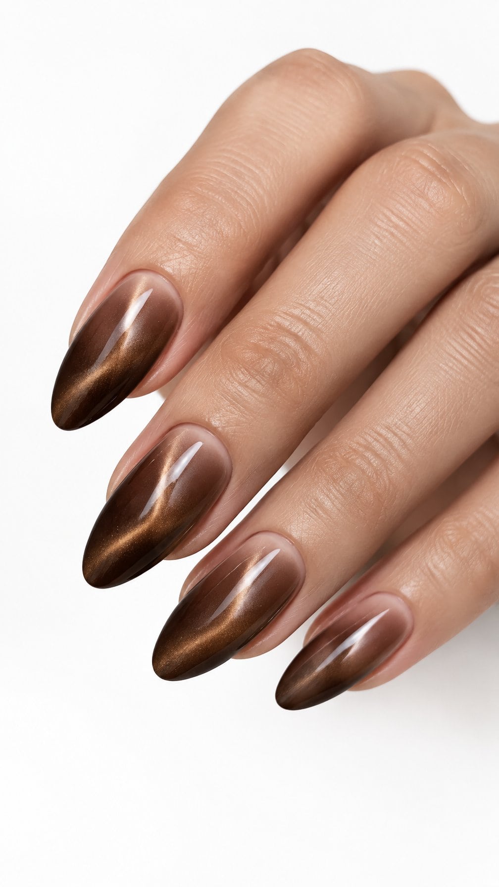 Glossy brown ombre almond-shaped nails with a subtle shimmering finish