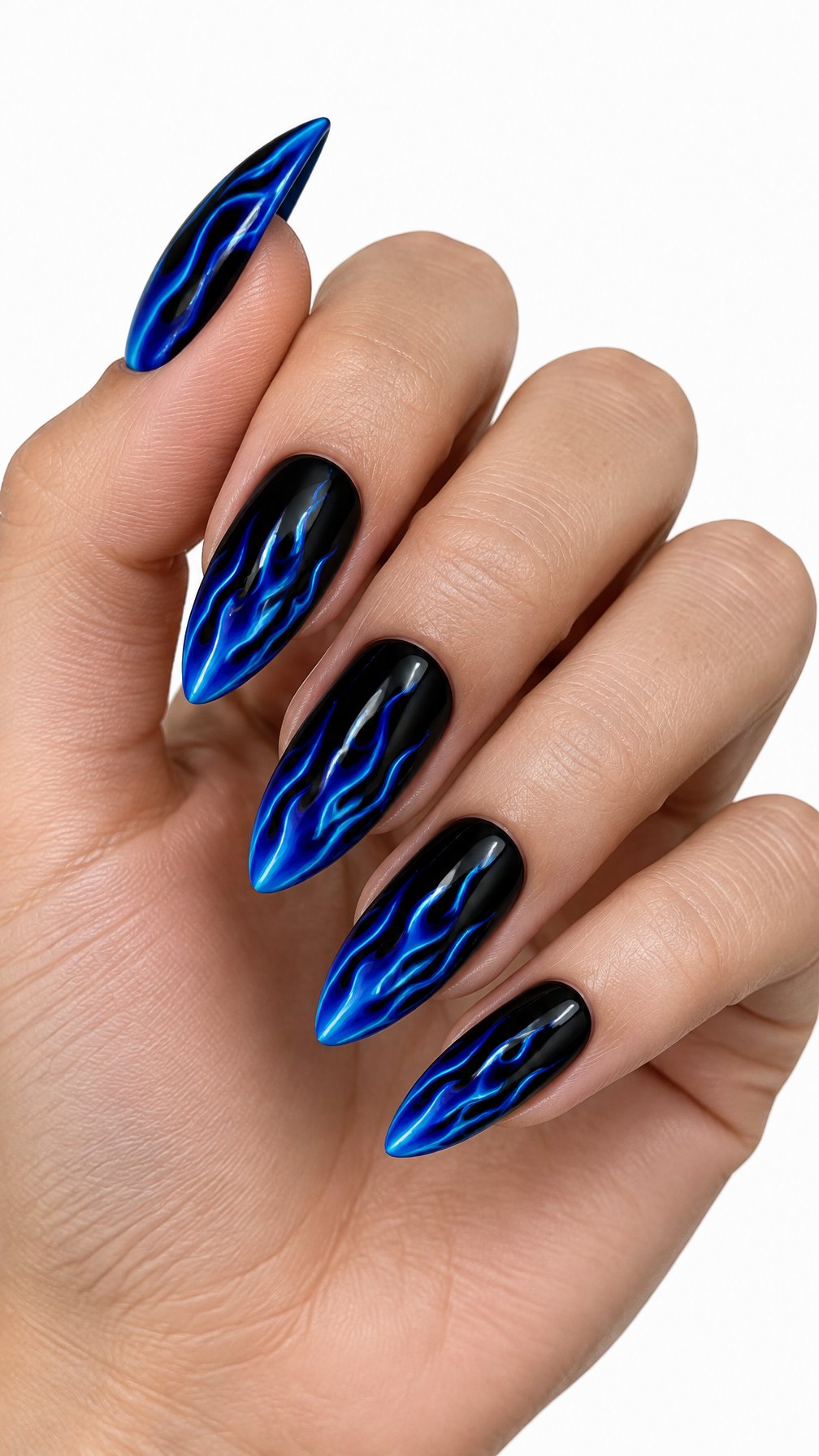 A single hand with glossy black almond-shaped nails decorated with bright blue flame designs against a white background.