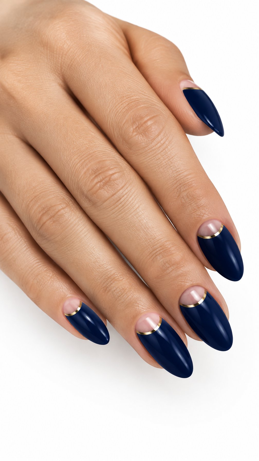 A single hand with glossy midnight blue nails decorated with thin gold arcs near the cuticles on a white background.