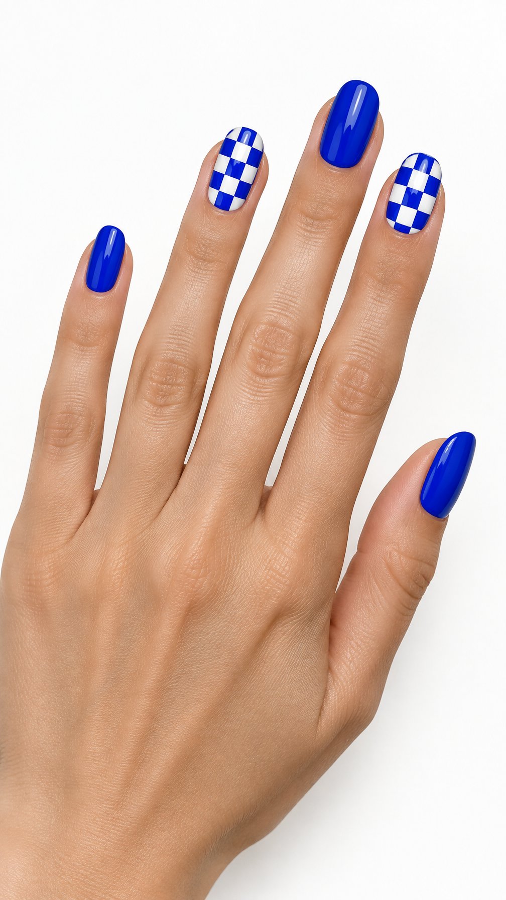 A single hand with glossy cobalt blue nails and white checkerboard accent nails against a white background.
