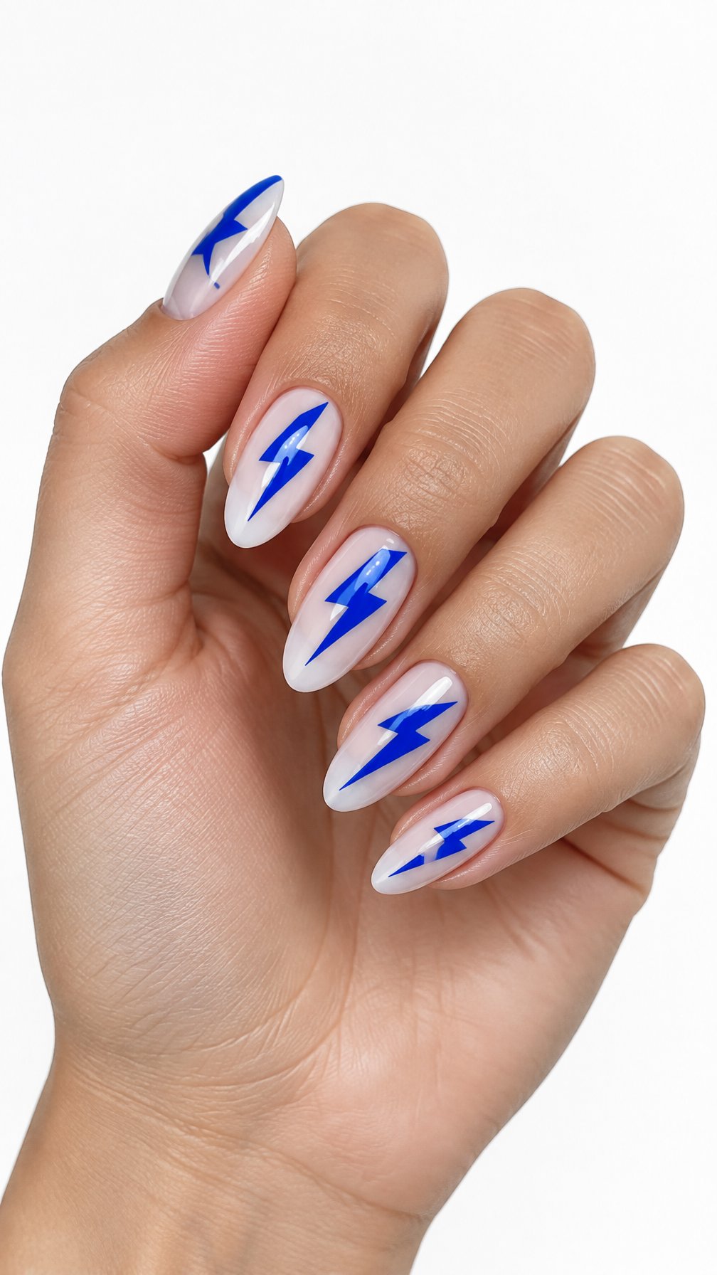 A single manicured hand displays glossy nude nails decorated with vivid blue lightning bolts against a white background.
