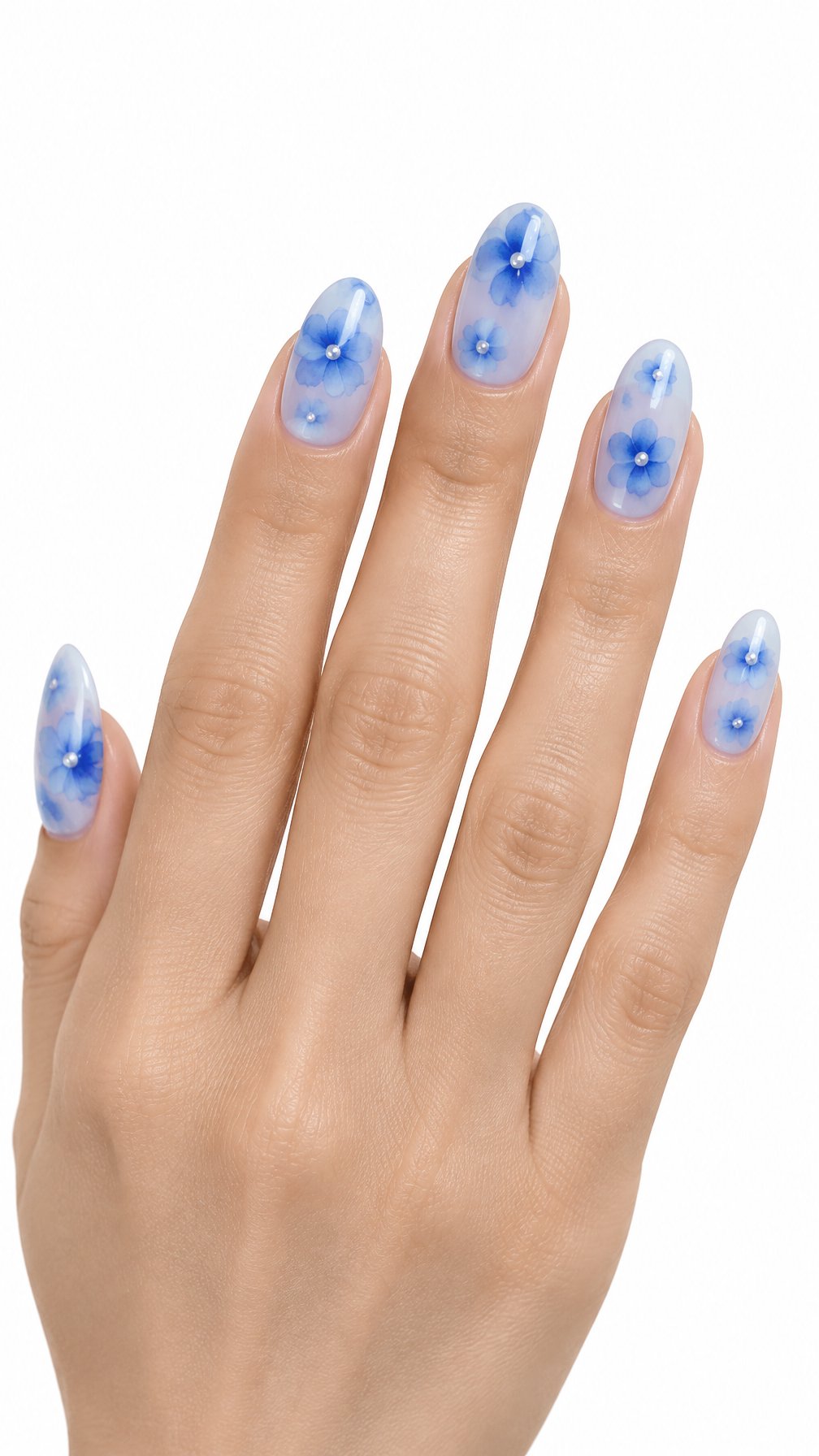 One hand with glossy blue floral nails featuring small pearl-like flower centers against a white background.