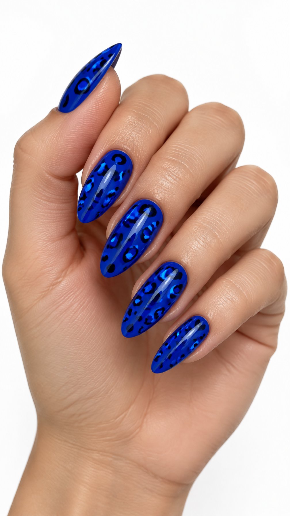 One hand with glossy electric blue leopard-print almond-shaped nails against a white background.