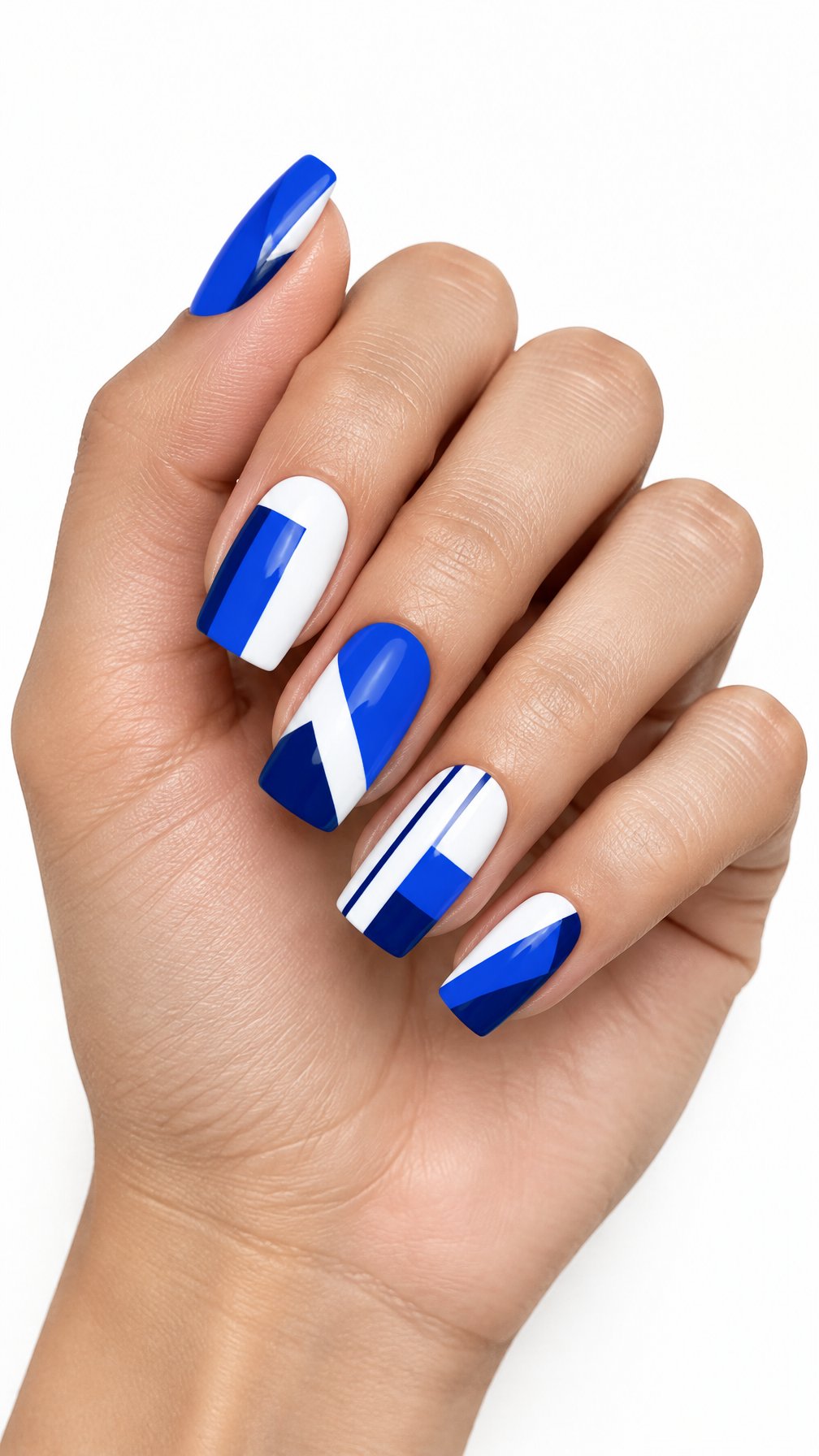 Close-up of one hand with glossy electric blue geometric color-block nail art on a white background.