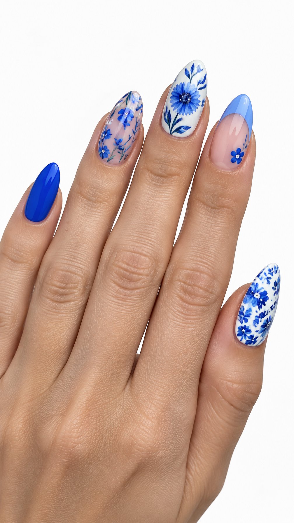 A single hand displays mismatched blue and white floral nail designs against a white background.