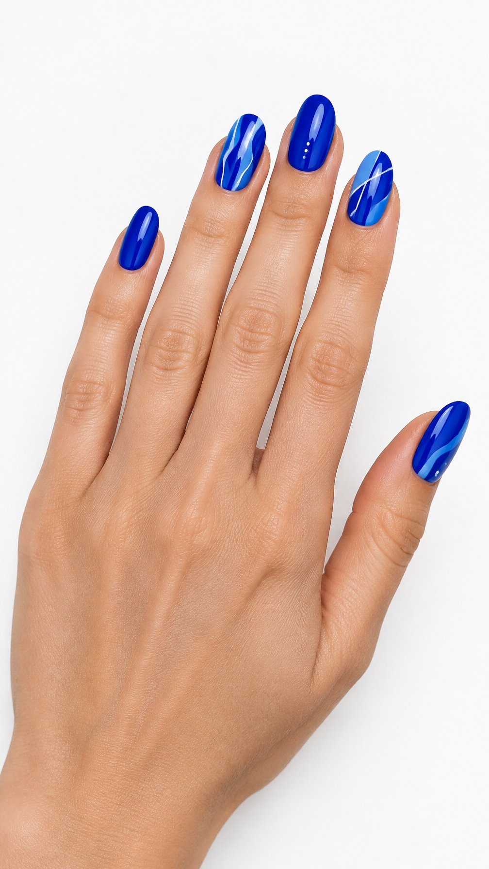 A single hand with glossy electric blue decorated nails rests against a white background.