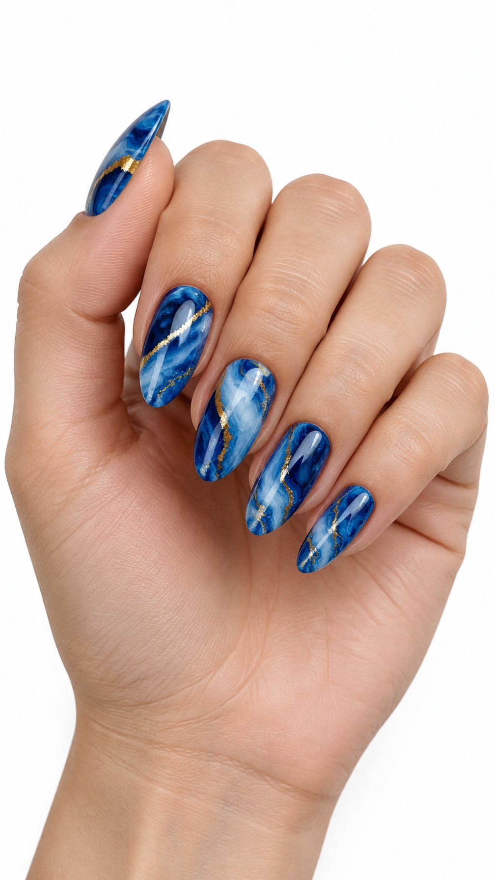 A single hand with glossy blue marble-patterned nails accented by thin gold veins rests against a white background.