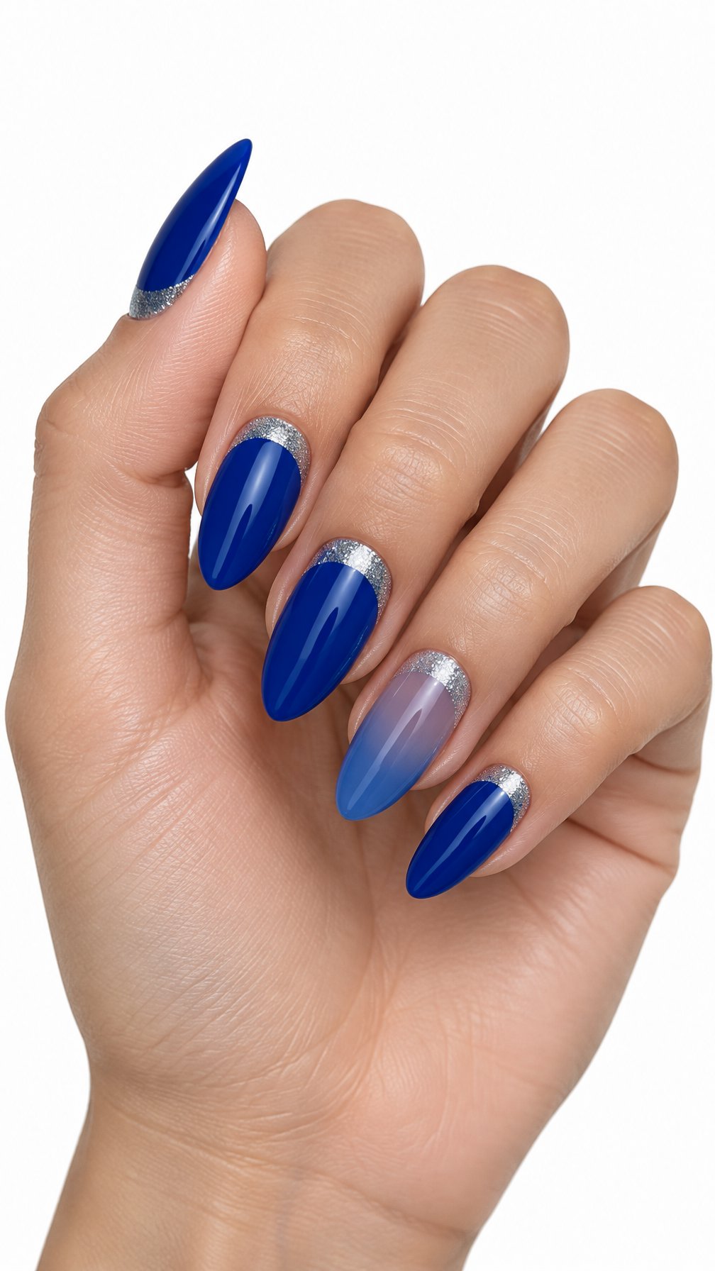 A single hand with glossy blue nails decorated with silver glitter crescent tips on a white background.