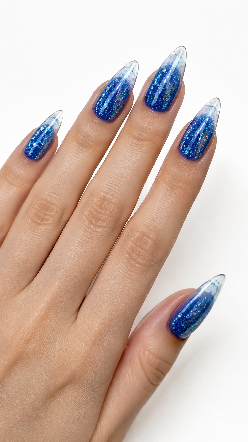 A single hand with long blue glitter nails and clear tips against a white background.