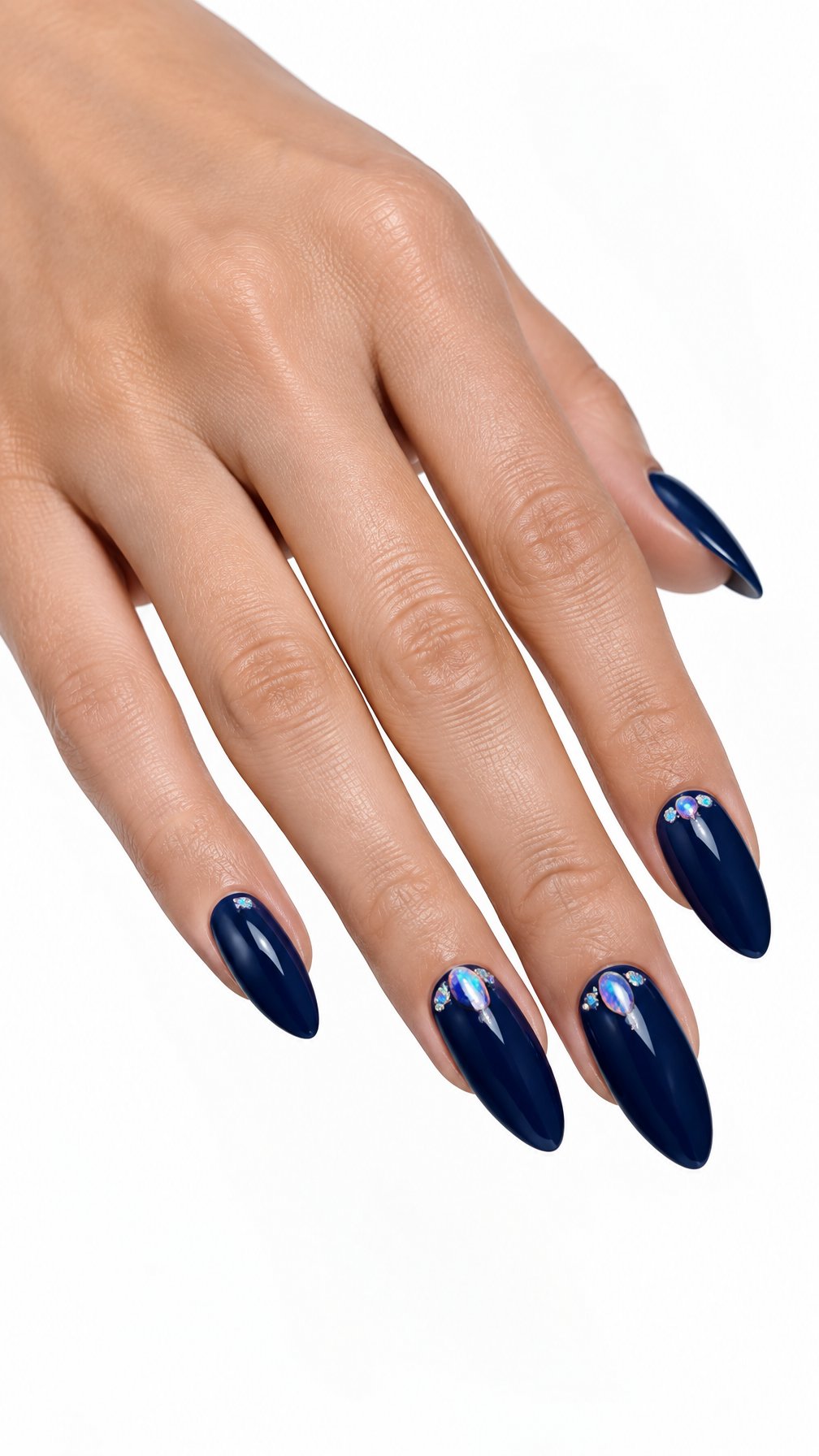 A single hand with glossy navy blue almond-shaped nails and iridescent opal accents on two fingers against a white background.