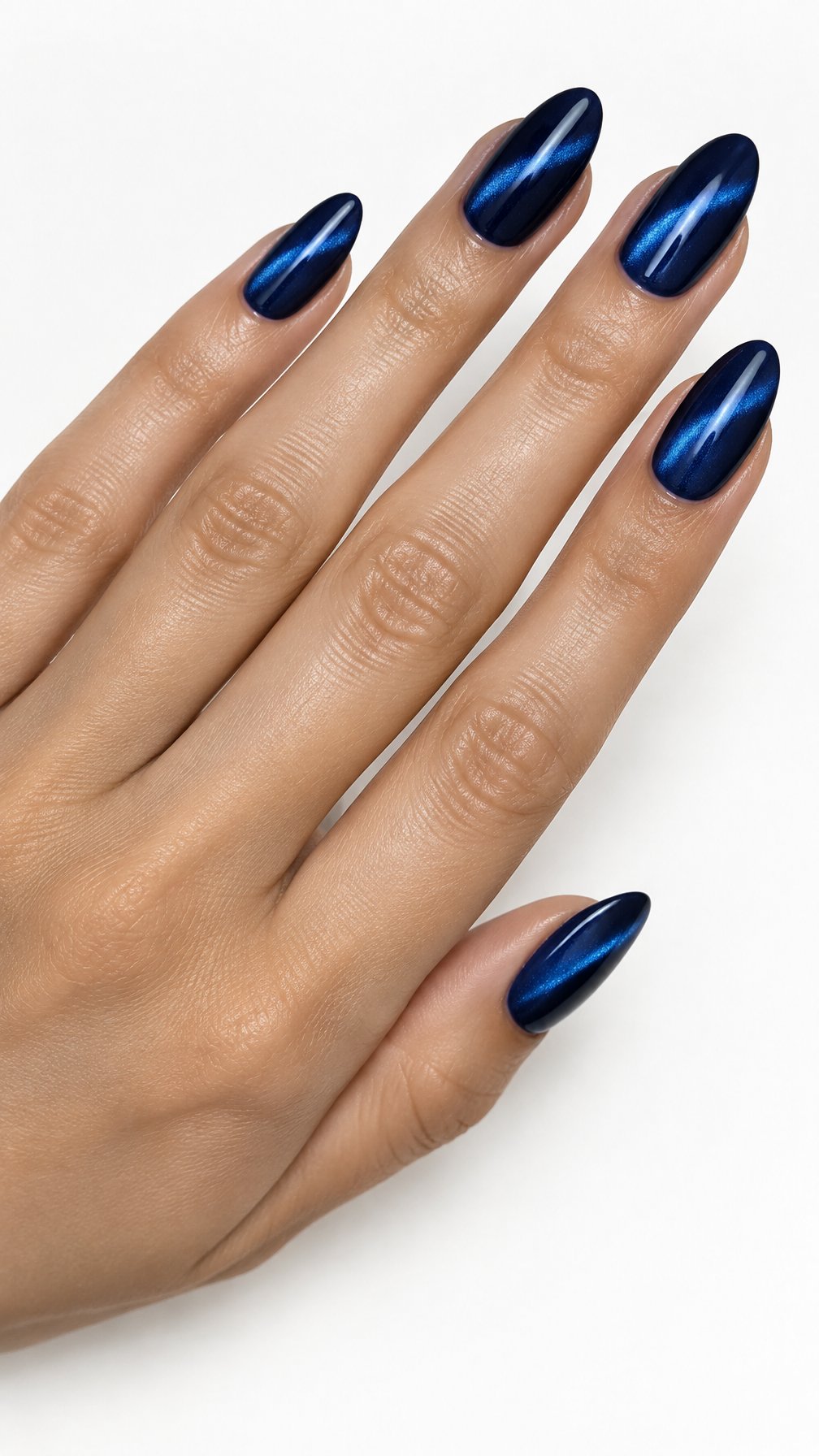 A single hand with long almond-shaped navy blue nails featuring shimmering diagonal highlights on a white background.