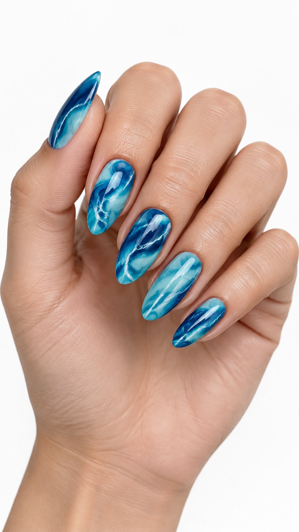 A single hand with glossy almond-shaped nails decorated in blue and white marble patterns against a white background.