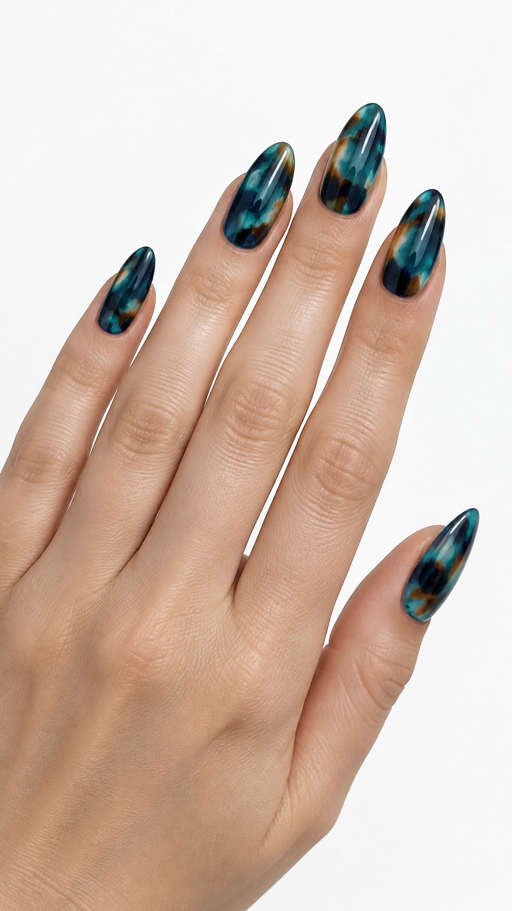 One hand with glossy teal blue tortoiseshell almond-shaped nails against a white background.