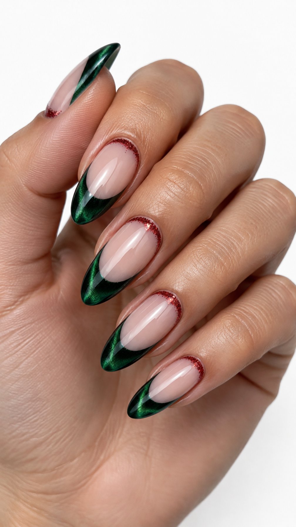 A single hand with emerald green French-tip nails and red glitter accents around the cuticles on a white background.