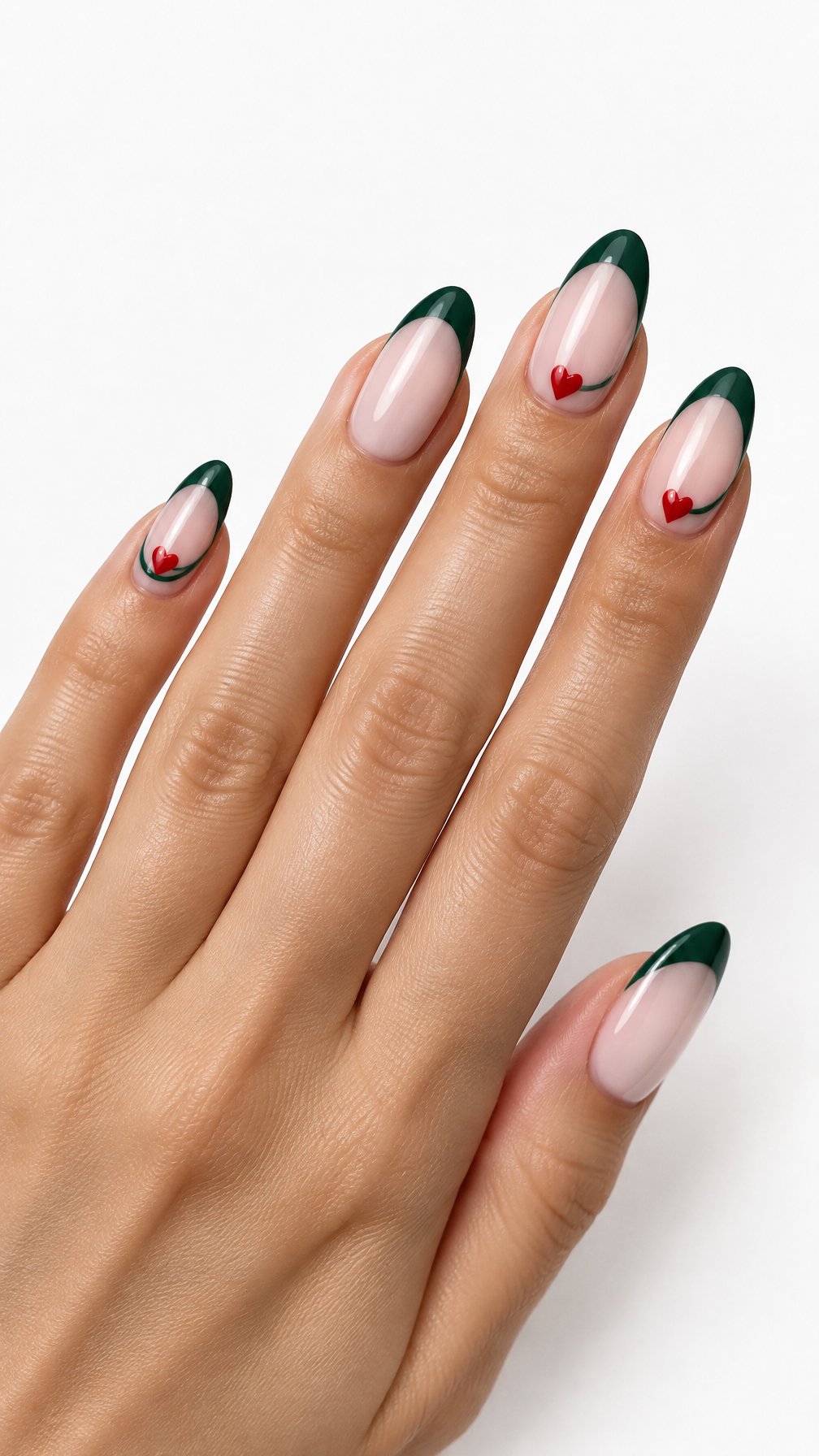A single hand with glossy green French-tip nails decorated with small red hearts against a white background.