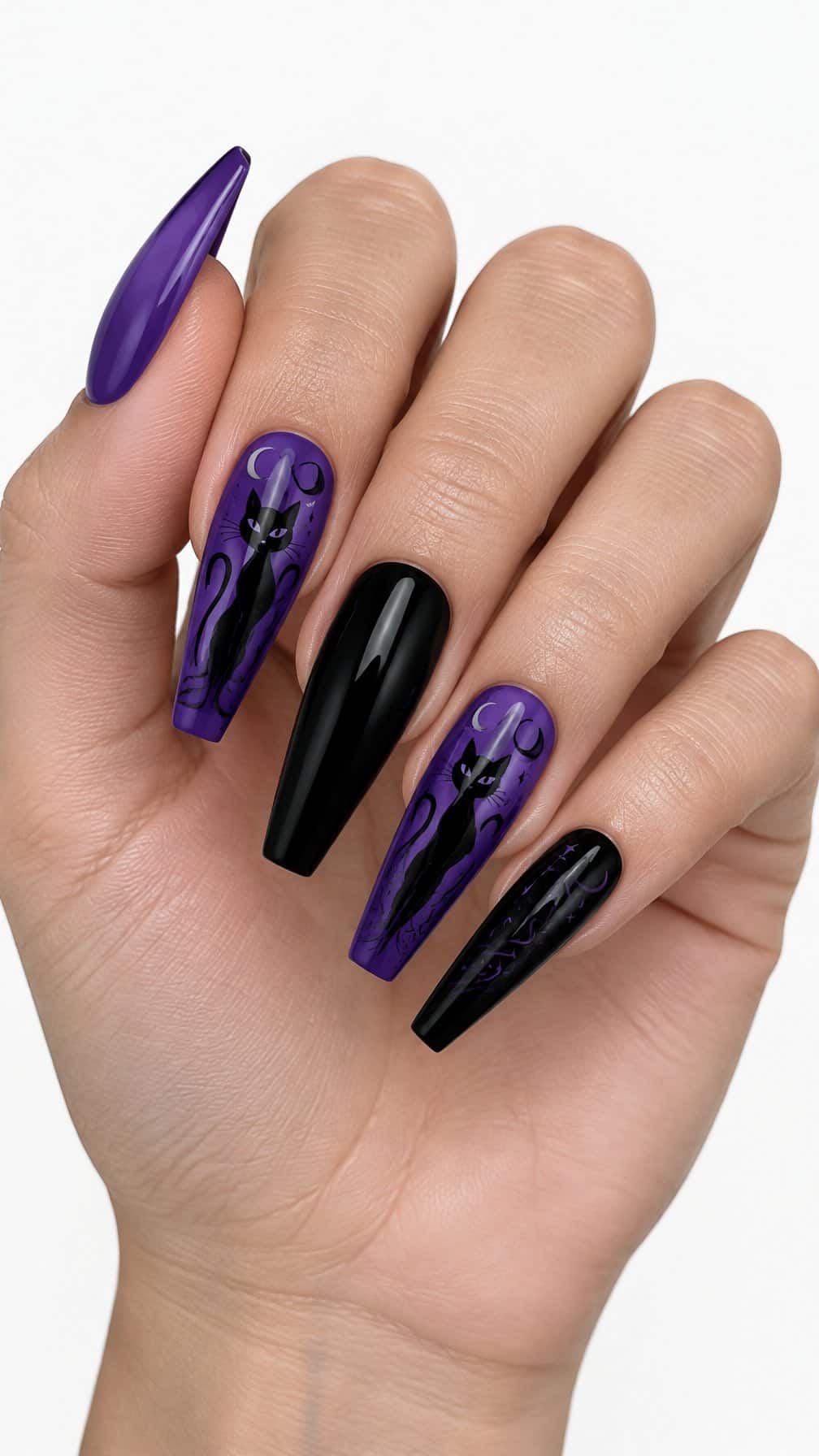 Long violet and black coffin-shaped nails featuring black cat designs